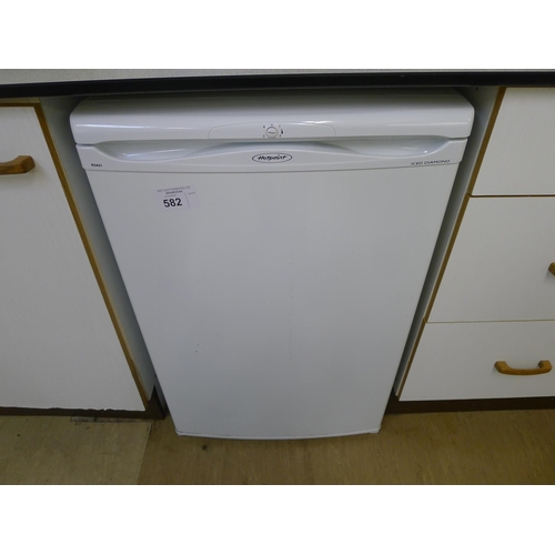 582 - A Hotpoint iced diamond under counter refrigerator