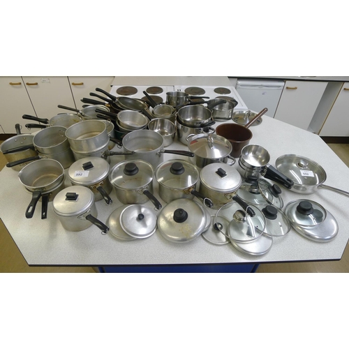 592 - A quantity of miscellaneous stainless steel and aluminium saucepans etc