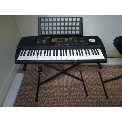 644 - A Yamaha PSR-225 touch response electric keyboard with stand & charger