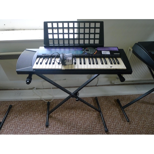 649 - A Yamaha PSR-73 electric keyboard with stand & charger