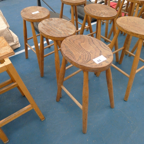 65 - 3 vintage wooden stools with oval seat pads approx 57cm tall