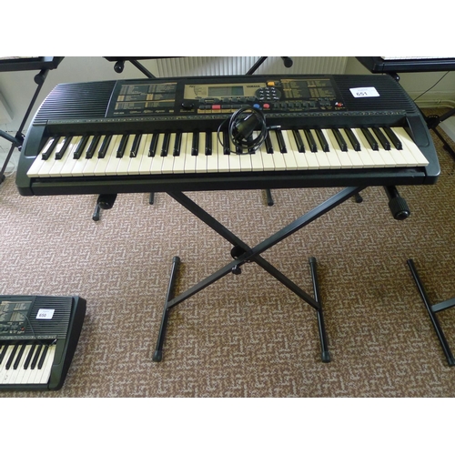 651 - A Yamaha PSR-225 touch response electric keyboard with stand & charger