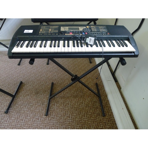 654 - A Yamaha PSR-225 touch response electric keyboard with stand & charger