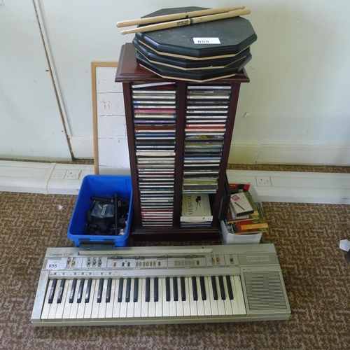 655 - An old Casio tone keyboard & other music related items