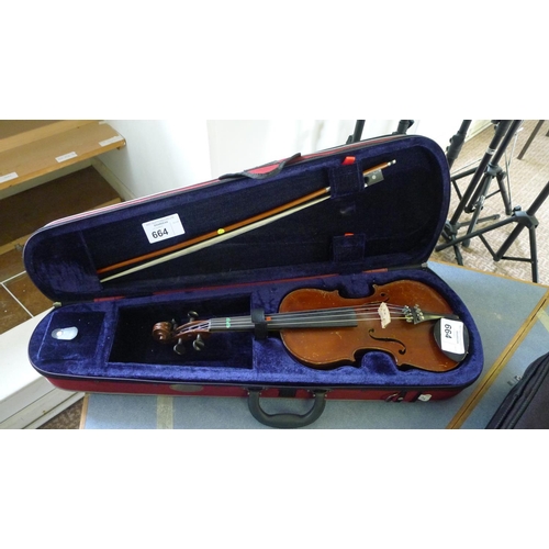 664 - A violin, bow and carry case