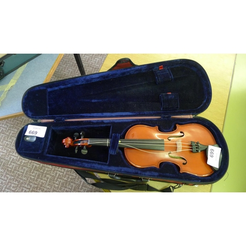 669 - A violin and carry case (no bow)