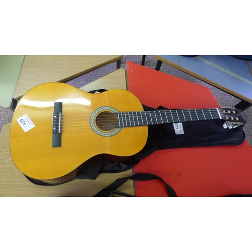 671 - A 6-string acoustic guitar