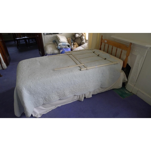 693 - A single bed and mattress with two headboards