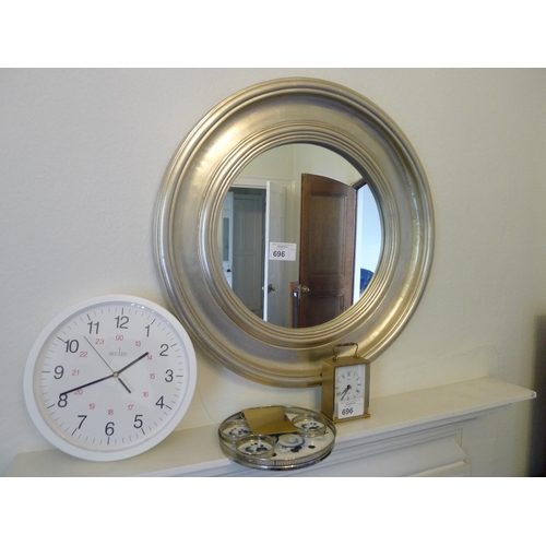 696 - Circular framed wall mirror, 2 clocks and a small silver plated tray and coasters