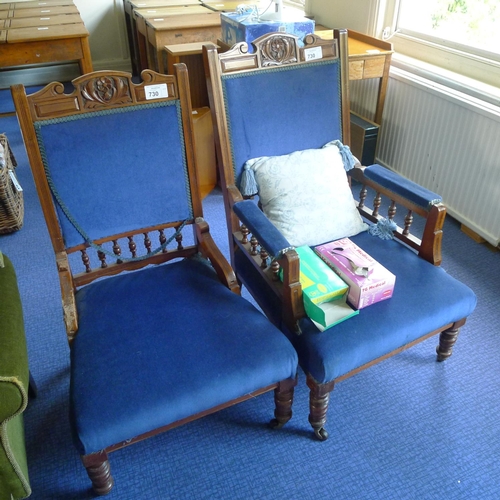 730 - An Edwardian carved mahogany gentleman's chair in blue upholstery and a matching ladies chair