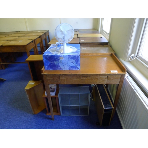 735 - A golden oak writing table, and electric fan, a foot massager, an electric convector heater and vari... 