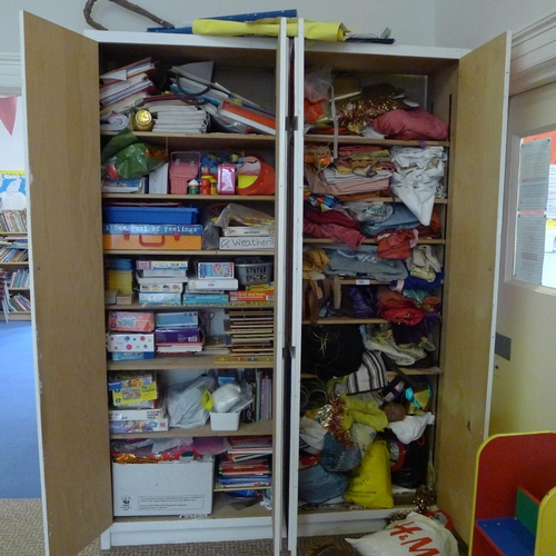 766 - Contents of two cupboards to include; fabrics, toys and kindergarten teaching aides etc