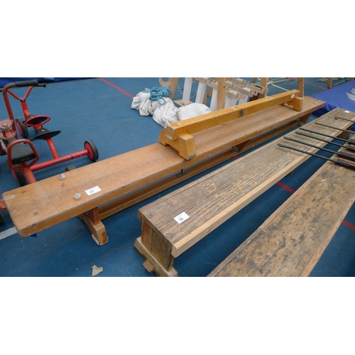 77 - 1 gymnasium wooden bench approx 335cm long / 30cm high (1 leg requires attention) & 1 bench frame wi... 