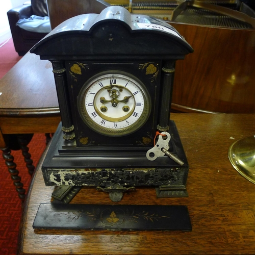 780 - A Victorian black marble cased temple style mantel clock