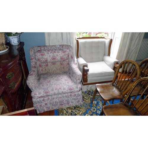 833 - A fawn upholstered easy armchair and a floral upholstered easy armchair