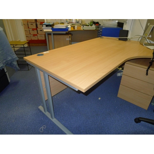 868 - Two modern light wood finished office desks each with a pedestal