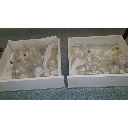 489 - 8 white trays containing a quantity of various laboratory glassware