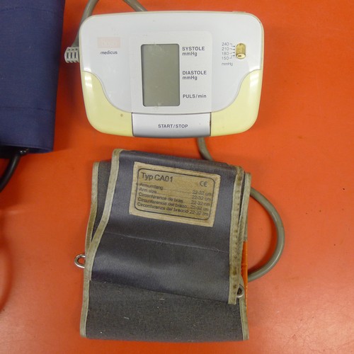 300E - A Lloyds Pharmacy fully automatic blood pressure monitor, a Diovan blood pressure gauge and a Boso-M... 