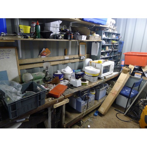 162 - A quantity of various items including 2 work benches, a bench grinder, storage cabinets containing v... 