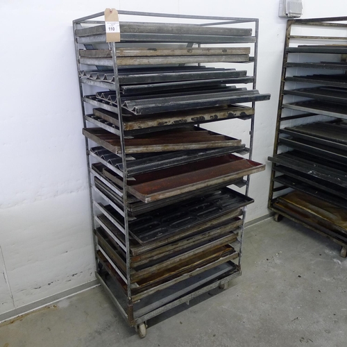 110 - 1 metal wheeled bakers rack containing a quantity of metal trays