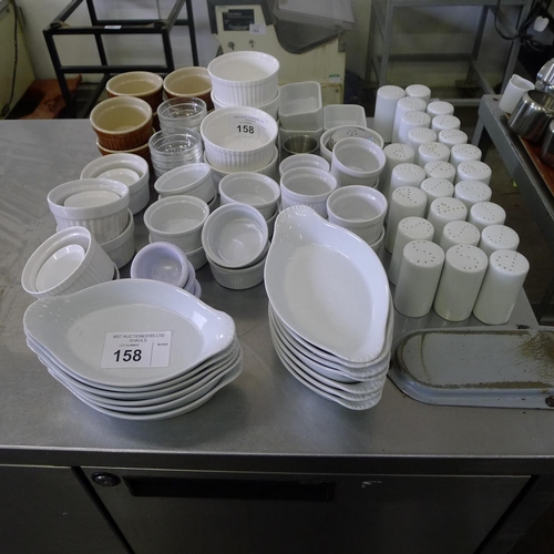 158 - A quantity of various crockery including ramekins, salt / pepper pots, oval dishes etc