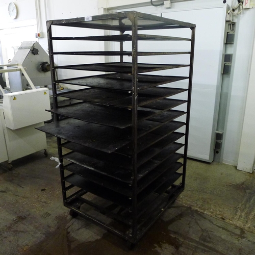 182 - 1 metal wheeled bakers rack containing a quantity of metal trays