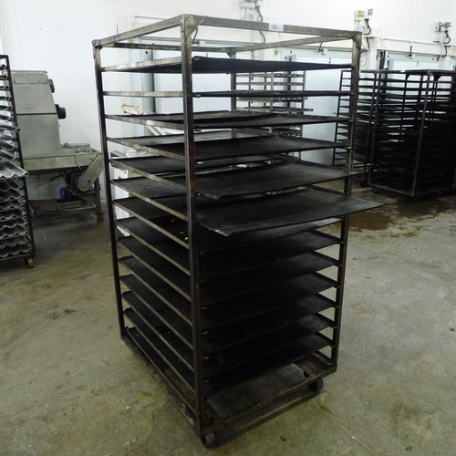 190 - 1 metal wheeled bakers rack containing a quantity of metal trays