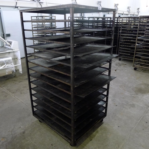 191 - 1 metal wheeled bakers rack containing a quantity of metal trays