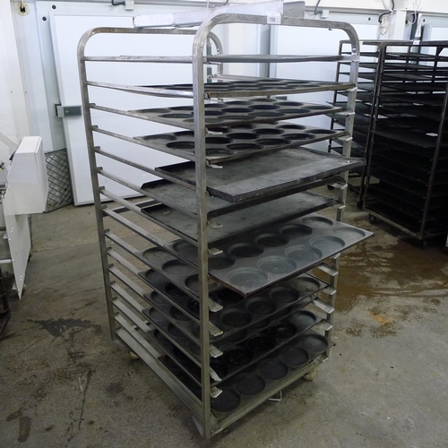 198 - 1 metal wheeled bakers rack containing a quantity of metal trays