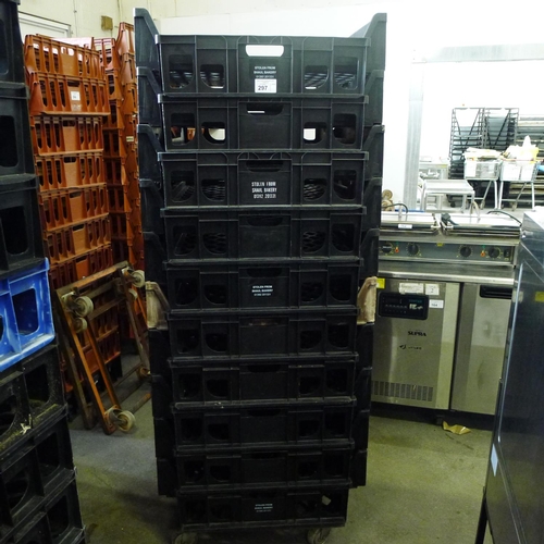 297 - 60 stacking plastic bread trays and 3 wheeled skates (mainly black coloured)