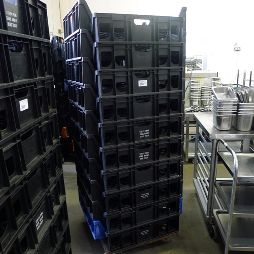 300 - 60 stacking plastic bread trays and 3 wheeled skates (mainly black coloured)