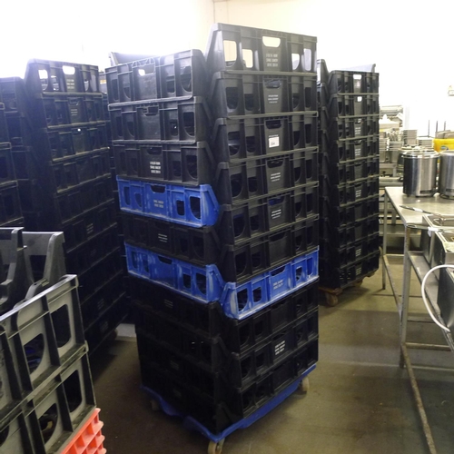 304 - 60 stacking plastic bread trays and 3 wheeled skates (mainly black coloured)