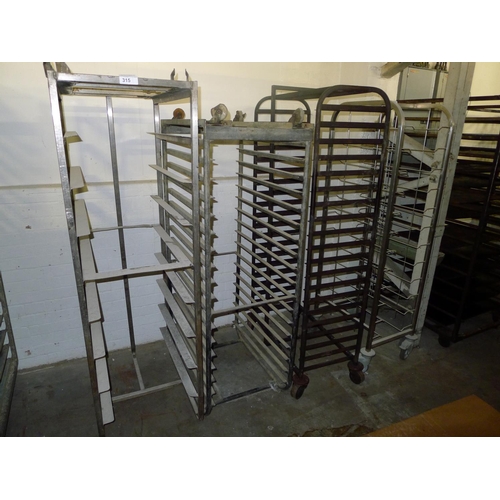 315 - 4 metal wheeled bakers racks - No metal trays are included and please note that one rack has no whee... 