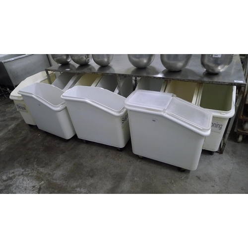 386 - 10 wheeled white plastic ingredient bins - most but not all have lids