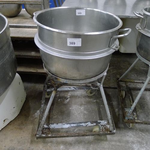 389 - 1 stainless steel mixer bowl with a wheeled stand diameter approx 50cm / 60 quart