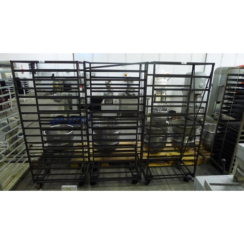 395 - 3 wheeled metal bakers racks - No trays included