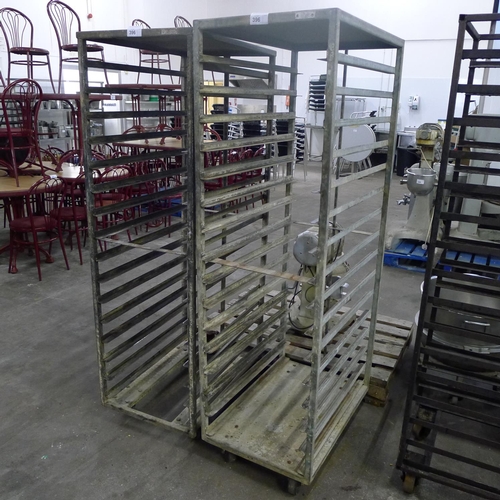 396 - 2 wheeled metal bakers racks - No trays included