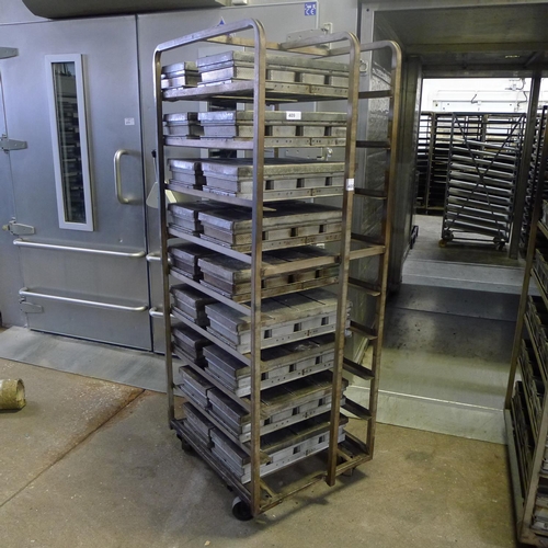 409 - 1 wheeled metal bakers rack containing 18 sets of 4 bread tins (for 800g loaves) and 18 lids