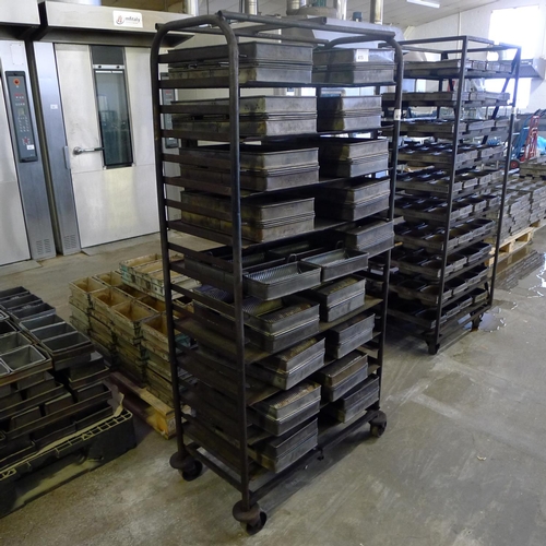 415 - 1 wheeled metal bakers rack containing 18 sets of 3 fluted bread tins (for 400g loaves) - each set o... 