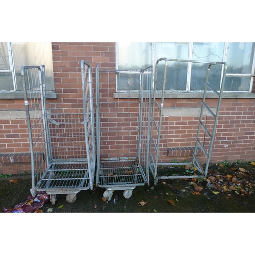 439 - 2 wheeled metal cages and 1 display rack (no shelves)