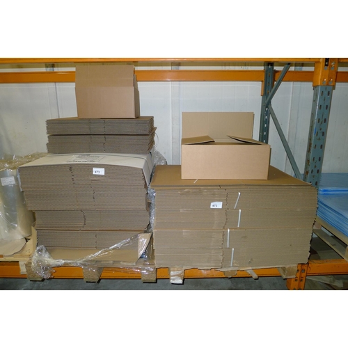 473 - 2 pallets containing a quantity of flat packed cardboard boxes, some approx 40cm x 30cm x 20cm & som... 