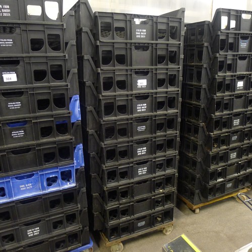 303 - 60 stacking plastic bread trays and 3 wheeled skates (mainly black coloured)