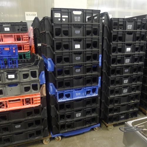 304 - 60 stacking plastic bread trays and 3 wheeled skates (mainly black coloured)