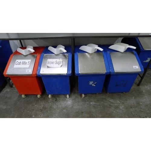 358 - 4 plastic wheeled ingredient bins with lids (3 blue and 1 red) & 4 white plastic scoops