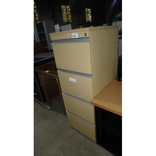 3444 - A light wood 4 drawer filing cabinet by Morris - unlocked and NO key included