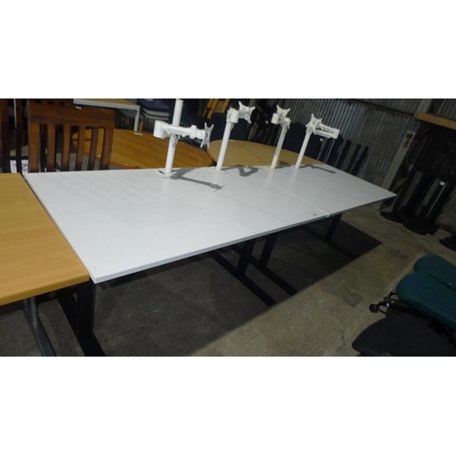 3462 - 1 white office table approx 140cm x 80cm x 75cm with 2 monitor support arms attached