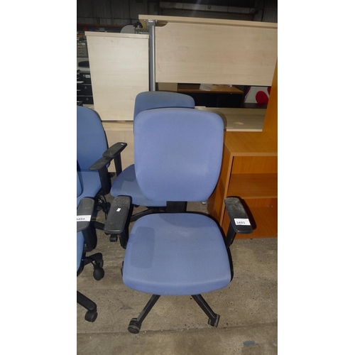 3493 - 2 light blue upholstered office swivel chairs