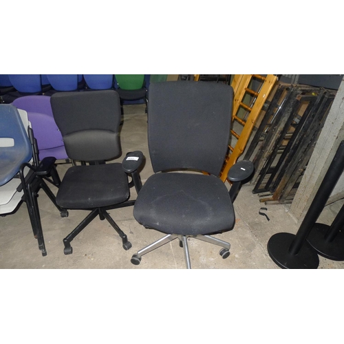 3517 - 2 black upholstered office swivel chairs - both need attention to gas lifts