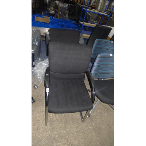 3558 - 2 black upholstered cantilever chairs - similar but non matching