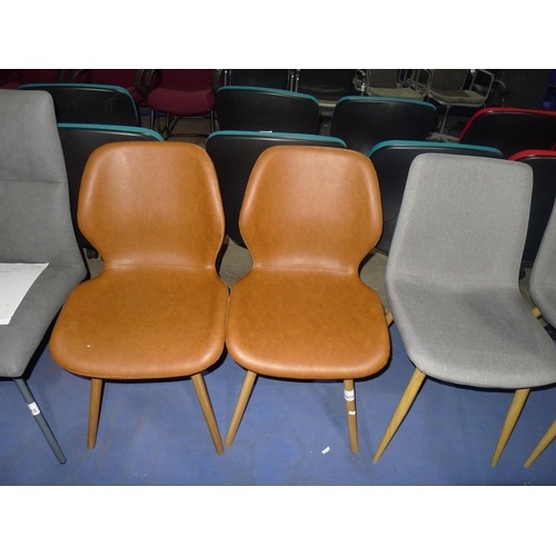 3574 - 2 tan upholstered dining chairs